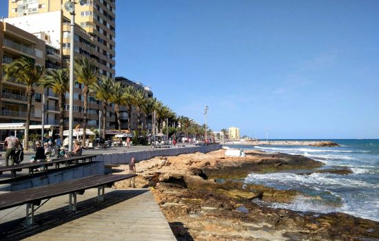 pexels photo 28773424 28773424 1 A vibrant view of Torrevieja's seafront promenade and beach on a sunny day, ideal for summer travel concepts.